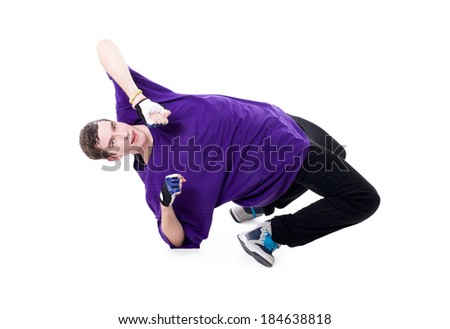 Dancing boy in movement (hip hop style). Isolated on white