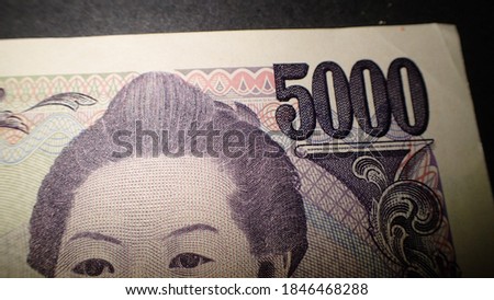 Close up macro detail of Japanese (Yen) banknotes; detail photo of Yen. Business, Finance, World money concept, inflation and economy concept