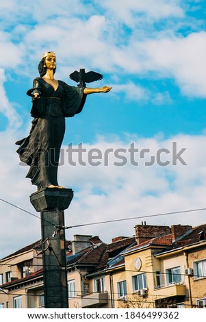 Saint Sofia (Sophia) monument in Sofia, Bulgaria. City monument and landmark. A bronze and gold statue of woman. High quality photo