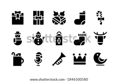 Christmas Glyph Icons Including Box, Gift, Jingles, Socks, Candy, Snowman, Snowman, Lamp, Socks, Deer, Mugs, Microphone, Trumpet, Crown, Bird