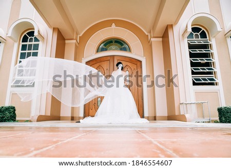 Elegant Shots for Bride and Groom Inside and Outside of the Church During Wedding Day