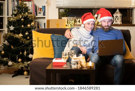couple celebrating Christmas at home social distancing
