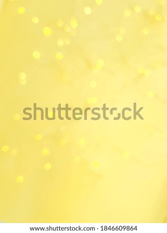 The golden side's or boke on a yellow background. Merry Christmas and happy New Year. Christmas background.
