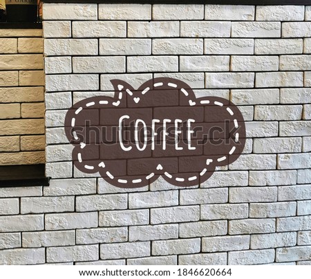 front coffee brown color on white brick background 