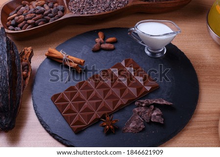 chocolate bar sweets compositionon the wooden background