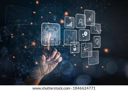 Touch your hand on a virtual screen AI processes a networked business marketing investment plan. Royalty-Free Stock Photo #1846624771