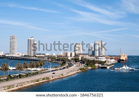 The view of Miami Main Channel and a busy traffic in MacArthur Causeway (Florida).