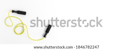 Jumping rope isolated on white background. Fitness concept. Banner Royalty-Free Stock Photo #1846782247
