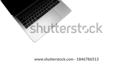 New high-speed thin silver aluminum laptop computer notebook side with touchpad, keyboard with Russian and English letters and open slots isolated on a white background