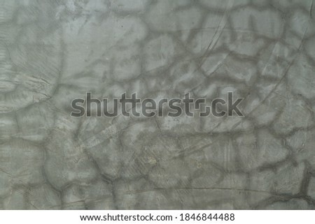 Craze or hairline cracks texture on the surface of raw cement concrete background. Royalty-Free Stock Photo #1846844488