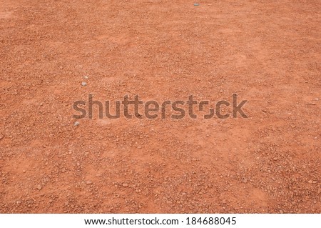 Filled with dust dirt road in the countryside Royalty-Free Stock Photo #184688045