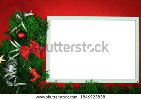 Christmas card as background with place for text. Side view. Greeting card mockup with Christmas decorations, streamer, balls, gifts. Invitation, paper. Place for text