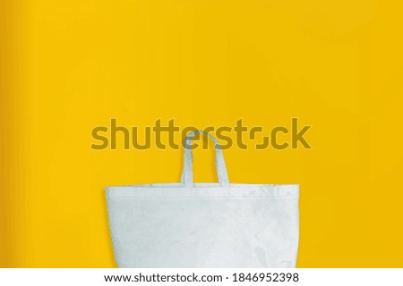 Beautiful Non Woven grocery shopping bag with yellow background