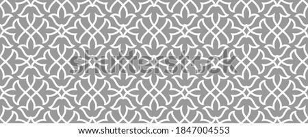 Pattern with floral and geometric elements. Intersecting curved bold stripes forming abstract floral ornament in Arabic style. Arabesque design for design. Seamless Decorative lattice. Royalty-Free Stock Photo #1847004553