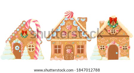 set of three bakery houses. Christmas gingerbread. cookies in the form of houses with candy decorations. christmas sweets and gifts. striped lollipops. street of fairy houses Royalty-Free Stock Photo #1847012788