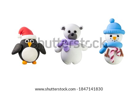 
Merry Christmas and Happy and happy new year. baer,Snowman, and penguin isolate on white.Clay art style, Cliping path in side.