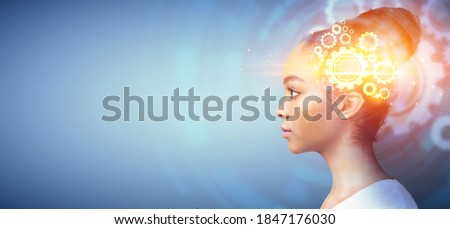 Side view of African American woman with shiny wheels inside her head representing thought process, space for text. Intelligence and smart ideas, creativity and innovations concept Royalty-Free Stock Photo #1847176030