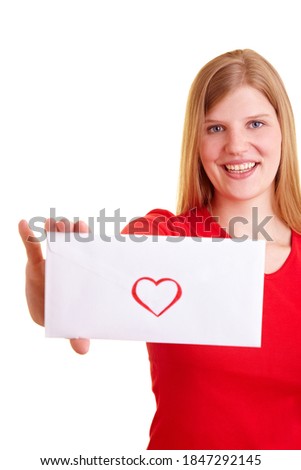 Blonde woman shows a love letter Royalty-Free Stock Photo #1847292145