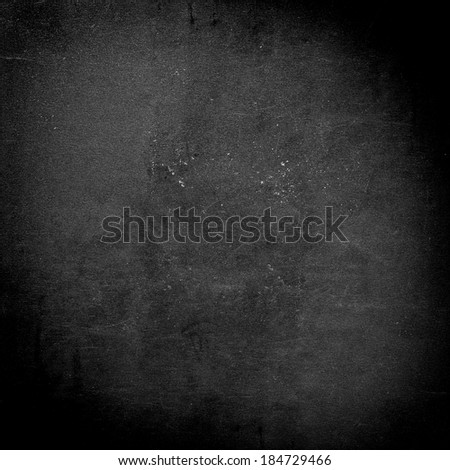 Detailed dark grunge background with scratches and stains 