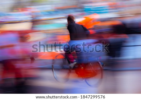 Abstract photography. Riding a bike somewhere in the city