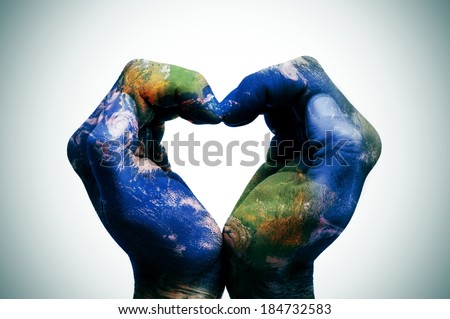a world map in man hands forming a heart (Earth map furnished by NASA) Royalty-Free Stock Photo #184732583