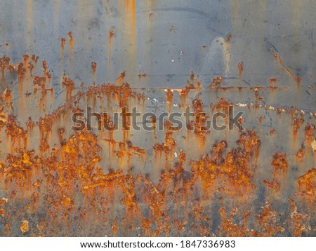 The walls of the ship are rusted from prolonged use in the ocean.Rusty iron blackground.