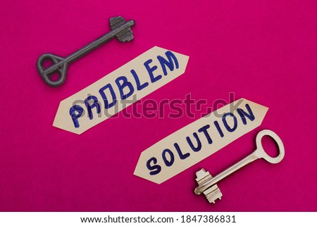 Looking for problem solution concept. Inscription "Problem solution" with keys on bright pink background 