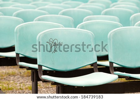 Abstract composition, background and texture from backrest of the seats and seats outdoors 