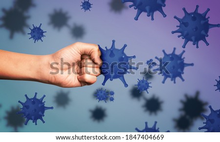 Be healthy - boost your immunity to fight with illness. Man showing clenched fist surrounded by viruses, closeup Royalty-Free Stock Photo #1847404669