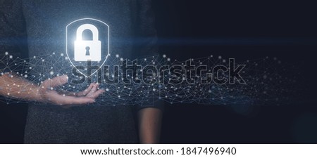 Hand hold the padlock hologram on hand. Concept of network security Cyber security network. Padlock icon and internet technology networking
