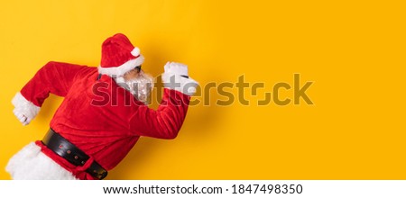 santa claus isolated on background running or running away fast