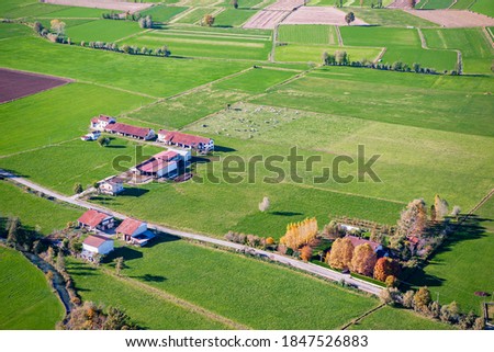 Autumn aerial view of a typical farm in the Piedmontese plain. Province of Cuneo. Italy, Europe
