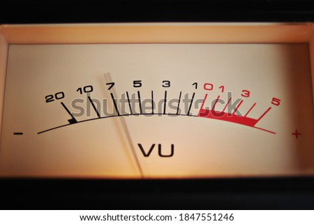 Close up of a studio mixer VU, volume meter. A symbol of music production and recording