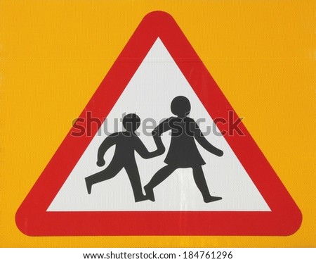 School warning road sign on a yellow background. 