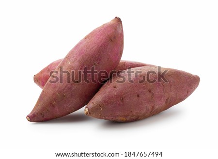 Multiple sweet potatoes on a white background