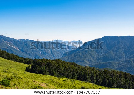 Beautiful Scenery of the green mountain and blue sky at Hehuanshan Main Peak, Taroko National Park, Wuling, Nantou County, Taiwan