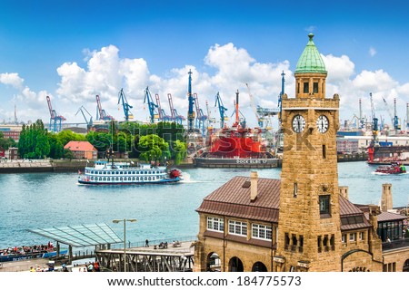 Beautiful view of famous Hamburger Landungsbruecken with harbor and traditional paddle steamer on Elbe river, St. Pauli district, Hamburg, Germany Royalty-Free Stock Photo #184775573