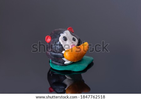 children's craft from plasticine-hamster with a carrot, creativity, modeling with children