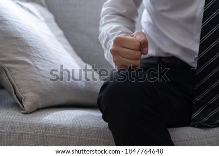 Portrait of an Asian man spending time in the room Royalty-Free Stock Photo #1847764648