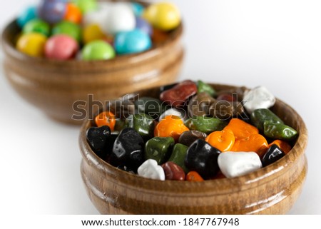 multicolor sugar coated chocolates background