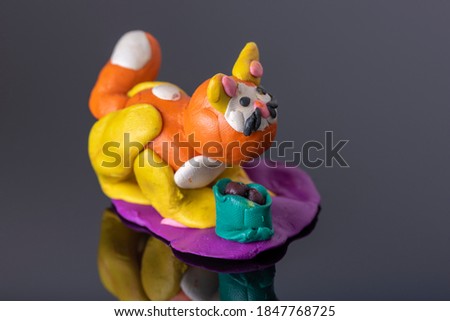 plasticine craft - kitten, modeling with children
