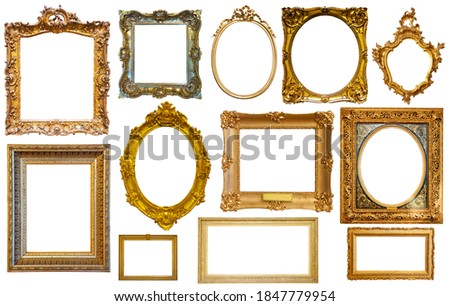 assortment of golden and silvery art and photo frames isolated on white background