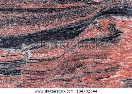 beautiful reddish-brown interior decorative stone marble abstract cracks and stains on the surface 