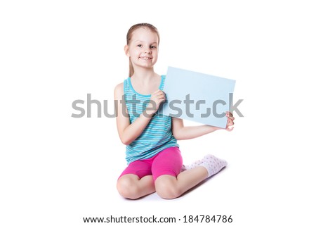 girl holding a sheet of paper