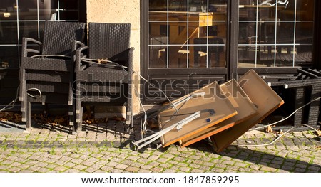 Closed restaurant in Germany due to corona virus epidemic  lockdown, stored chairs and tables, symbolic picture