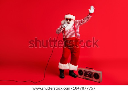 Full length body size view of his he handsome bearded fat overweight talented Santa vocalist star idol singing hit having fun chill out leisure isolated bright vivid shine vibrant red color background