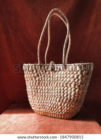 Beach bag straw handbag water hyacinth dried plant handmade bag isolated traditional Thai craft summer accessories eco friendly item recycle material product summer tropical girl holiday wicker work