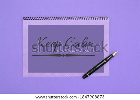 Keep Calm a Solution Will Come Sign with ink pen on purple background