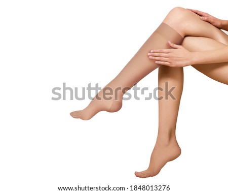 Compression Hosiery. Medical Compression stockings and tights for varicose veins and venouse therapy. Tights for man and women. Clinical compression knits. Comfort maternity tights for pregnant women. Royalty-Free Stock Photo #1848013276