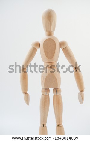 Image of a wooden doll
